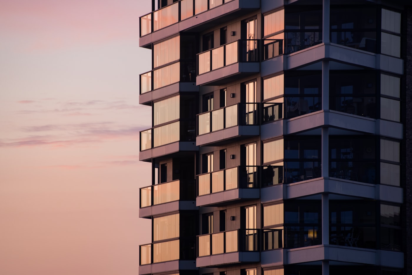 High-end white residential building reaching completion